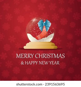 Merry christmas snow globe with a  Mittens and socks under the snow. New Year gift. Concept for holiday, winter holidays, New Year, Christmas