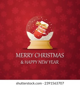 Merry christmas snow globe with a  Mittens and socks under the snow. New Year gift. Concept for holiday, winter holidays, New Year, Christmas