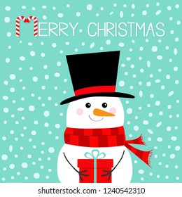 Merry Christmas. Snowman holding gift box present. Carrot nose, black hat, red scarf. Happy New Year. Cute cartoon funny kawaii character. Blue snow winter background. Flat design. Vector illustration