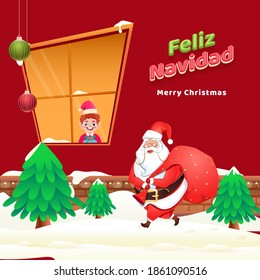 Merry Christmas Text in Spanish Language with Cartoon Boy, Xmas Trees and Santa Claus Lifting A Heavy Bag on Red Snowy Background.