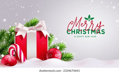 Merry christmas text vector design. Christmas gift box and xmas balls in snow frost outdoor winter background. Vector illustration holiday greeting card.