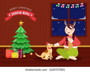 Merry Christmas Text Written In French Language With Decorative Xmas Tree, Gift Boxes, Cheerful Girl Holding Pastry And Dog Wear Santa Hat On Interior View.