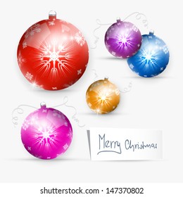 Merry Christmas Theme - colorful christmas balls on grey background