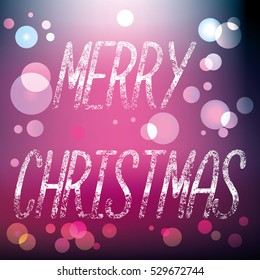 Merry Christmas typography. Blurred background. Letters in the form of a frosty rime