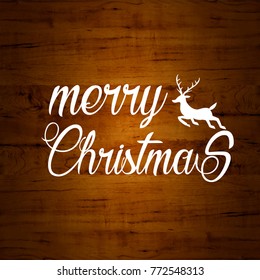 Merry christmas typography with wood background.