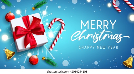 Merry christmas vector background design. Merry christmas text in blue space with gift, candy cane and bokeh lights xmas elements for holiday season greeting card. Vector illustration.
