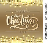 Merry Christmas vector lettering. Christmas calligraphy. Light bulbs, realistic retro garland, background with yellow glowing lights on brown background. Hand drawn clipart. Xmas design template.