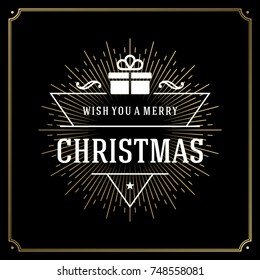 Merry Christmas vector text design greeting card template typography for holiday poster or postcard. Black background and golden star rays.
