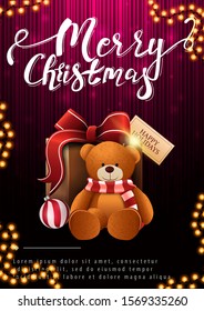 Merry Christmas, vertical postcard with present with Teddy bear on dark and pink background