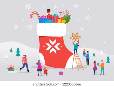 Merry Christmas, winter scene with a big red sock with gift boxes and small people, young men and women, families having fun in snow, skiing, snowboarding, sledding, ice skating