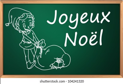 Merry christmas written in chalk on blackboard