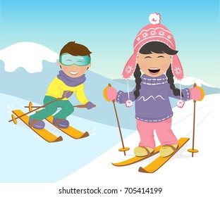 Merry girl and boy skiing in the mountains.