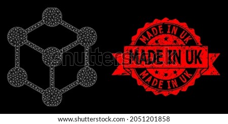 Mesh polygonal cube nodes on a black background, and Made in Uk rubber ribbon stamp. Red stamp has Made in Uk caption inside ribbon. Vector model created from cube nodes icon with triangular net.
