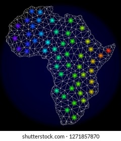 Mesh vector map of Africa with glare effect. Light spots have bright spectrum colors. Abstract lines, triangles, light spots and points on a dark background with map of Africa.