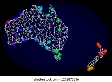 Mesh vector map of Australia and New Zealand with glare effect. Light spots have bright spectrum colors. Abstract lines, triangles,