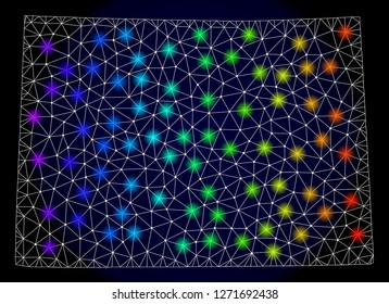 Mesh vector map of Colorado State with glare effect. Light spots have bright spectrum colors. Abstract lines, triangles, light spots and points on a dark background with map of Colorado State.
