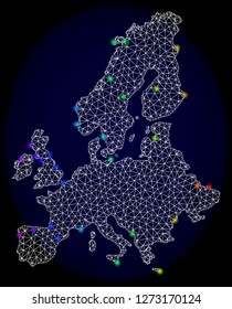 Mesh vector map of Euro Union with glare effect. Light spots have bright spectrum colors. Abstract lines, triangles, light spots and points on a dark background with map of Euro Union.