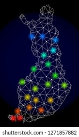 Mesh vector map of Finland with glare effect. Light spots have bright spectrum colors. Abstract lines, triangles, light spots and points on a dark background with map of Finland.