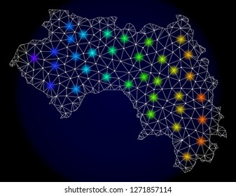 Mesh vector map of French Guinea with glare effect. Light spots have bright spectrum colors. Abstract lines, triangles, light spots and points on a dark background with map of French Guinea.