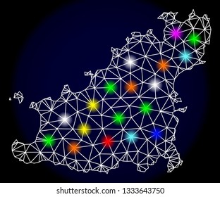 Mesh vector map of Guernsey Island with glare effect on a dark background. Abstract lines, triangles, light colorful spots and points forms map of Guernsey Island.