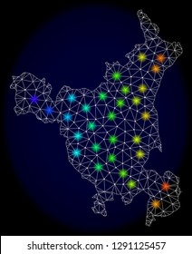 Mesh vector map of Haryana State with glare effect on a dark background. Light spots have bright rainbow colors. Abstract lines, triangles, light spots and points forms map of Haryana State.