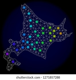 Mesh vector map of Hokkaido with glare effect. Light spots have bright spectrum colors. Abstract lines, triangles, light spots and points on a dark background with map of Hokkaido.