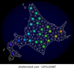 Mesh vector map of Hokkaido Island with glare effect on a dark background. Light spots have bright spectrum colors. Abstract lines, triangles, light spots and points forms map of Hokkaido Island.