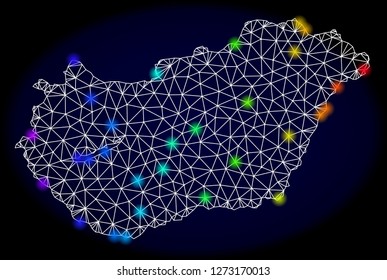 Mesh vector map of Hungary with glare effect. Light spots have bright rainbow colors. Abstract lines, triangles, light spots and points on a dark background with map of Hungary.