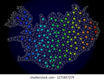 Mesh vector map of Iceland with glare effect. Light spots have bright spectrum colors. Abstract lines, triangles, light spots and points on a dark background with map of Iceland.