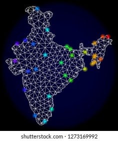 Mesh vector map of India with glare effect. Light spots have bright rainbow colors. Abstract lines, triangles, light spots and points on a dark background with map of India.