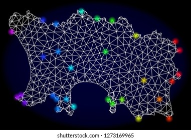 Mesh vector map of Jersey Island with glare effect. Light spots have bright spectrum colors. Abstract lines, triangles, light spots and points on a dark background with map of Jersey Island.