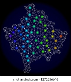 Mesh vector map of Kosovo with glare effect. Light spots have bright spectrum colors. Abstract lines, triangles, light spots and points on a dark background with map of Kosovo.