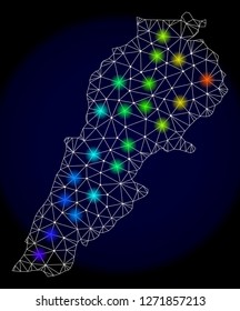 Mesh vector map of Lebanon with glare effect. Light spots have bright spectrum colors. Abstract lines, triangles, light spots and points on a dark background with map of Lebanon.