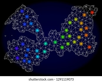 Mesh vector map of Leningrad Region with glare effect on a dark background. Light spots have bright spectrum colors. Abstract lines, triangles, light spots and points forms map of Leningrad Region.