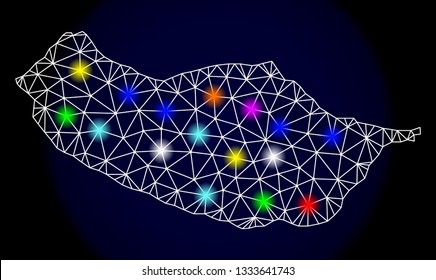 Mesh vector map of Madeira Island with glare effect on a dark background. Abstract lines, triangles, light colorful spots and points forms map of Madeira Island.