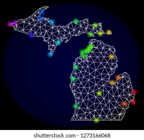 Mesh vector map of Michigan State with glare effect. Light spots have bright rainbow colors. Abstract lines, triangles, light spots and points on a dark background with map of Michigan State.