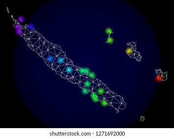Mesh vector map of New Caledonia Islands with glare effect. Light spots have bright spectrum colors. Abstract lines, triangles,