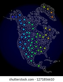 Mesh vector map of North America with glare effect. Light spots have bright spectrum colors. Abstract lines, triangles, light spots and points on a dark background with map of North America.