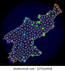 Mesh vector map of North Korea with glare effect. Light spots have bright spectrum colors. Abstract lines, triangles, light spots and points on a dark background with map of North Korea.