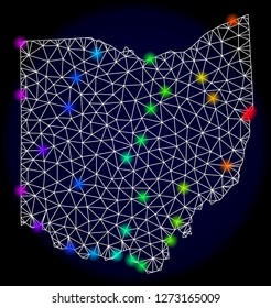 Mesh vector map of Ohio State with glare effect. Light spots have bright spectrum colors. Abstract lines, triangles, light spots and points on a dark background with map of Ohio State.