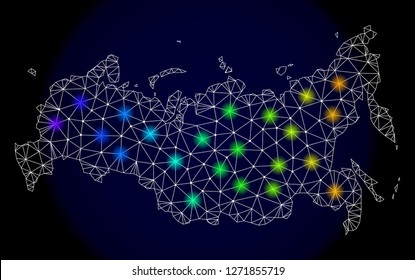 Mesh vector map of Russia with glare effect. Light spots have bright spectrum colors. Abstract lines, triangles, light spots and points on a dark background with map of Russia.