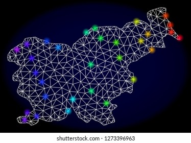 Mesh vector map of Slovenia with glare effect. Light spots have bright spectrum colors. Abstract lines, triangles, light spots and points on a dark background with map of Slovenia.