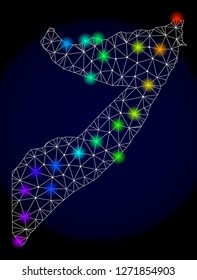 Mesh vector map of Somalia with glare effect. Light spots have bright spectrum colors. Abstract lines, triangles, light spots and points on a dark background with map of Somalia.