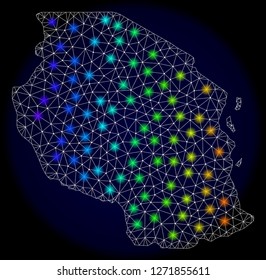 Mesh vector map of Tanzania with glare effect. Light spots have bright spectrum colors. Abstract lines, triangles, light spots and points on a dark background with map of Tanzania.