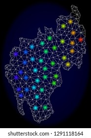 Mesh vector map of Tripura State with glare effect on a dark background. Light spots have bright spectrum colors. Abstract lines, triangles, light spots and points forms map of Tripura State.