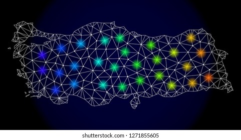Mesh vector map of Turkey with glare effect. Light spots have bright spectrum colors. Abstract lines, triangles, light spots and points on a dark background with map of Turkey.
