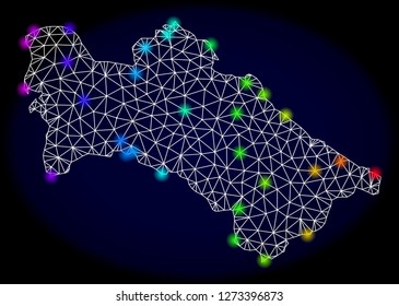 Mesh vector map of Turkmenistan with glare effect. Light spots have bright rainbow colors. Abstract lines, triangles, light spots and points on a dark background with map of Turkmenistan.
