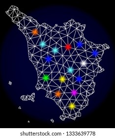 Mesh vector map of Tuscany region with glare effect on a dark background. Abstract lines, triangles, light colorful spots and points forms map of Tuscany region.