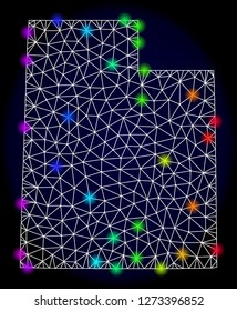 Mesh vector map of Utah State with glare effect. Light spots have bright spectrum colors. Abstract lines, triangles, light spots and points on a dark background with map of Utah State.