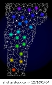 Mesh vector map of Vermont State with glare effect. Light spots have bright spectrum colors. Abstract lines, triangles, light spots and points on a dark background with map of Vermont State.